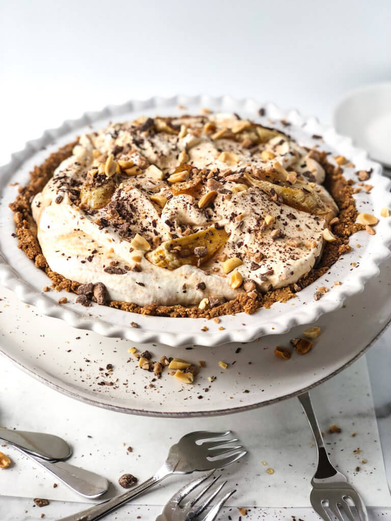 Shows 45-degree view of whole Peanut Banoffee Pie