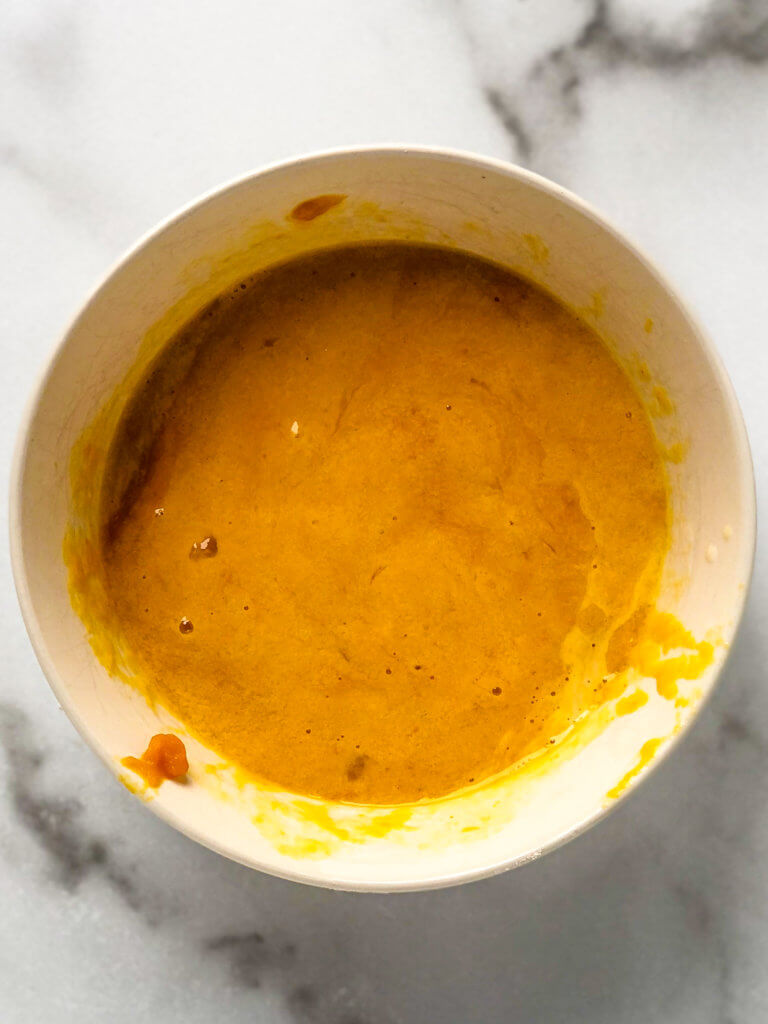 Process shot Shows mixed pumpkin, eggs buttermilk