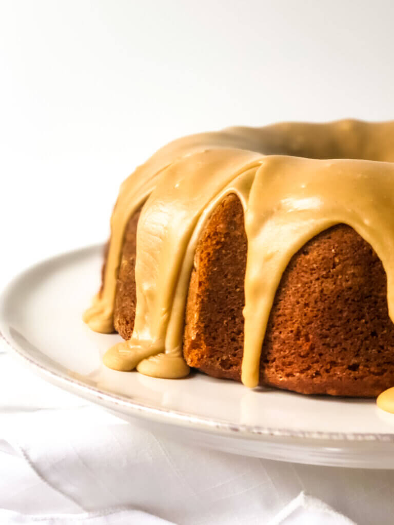 recipe featured image closeup of 1/2 Pumpkin bundt cake seen head-om