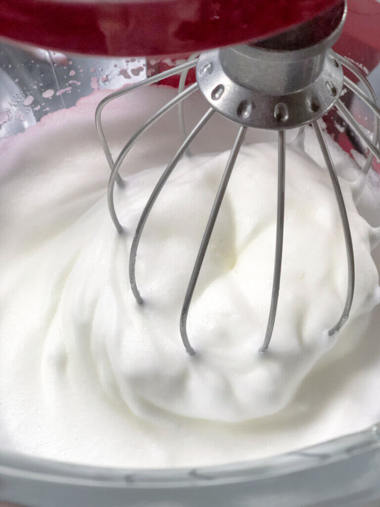 In making whipped egg whites for pavlova, first whip to soft peaks, along with sugar