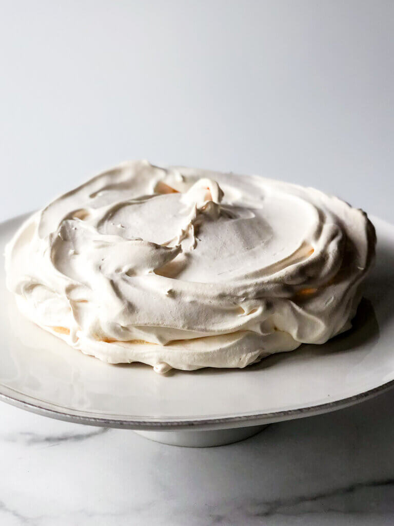 A fully baked pavlova shell should roughly retain its pre-baked shape but outsides should be crispy