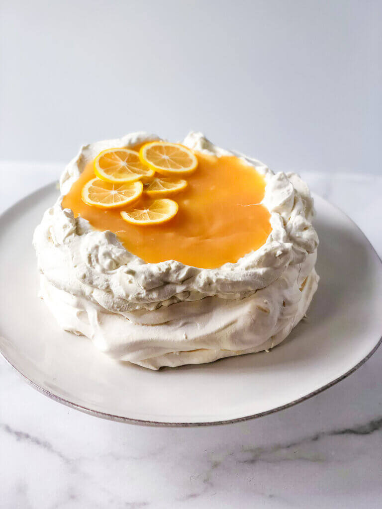 The lemon curd atop the flattened, rimmed surface of the mascarpone cream