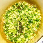 Shows the onion, celery, green pepper sauteeing in pot