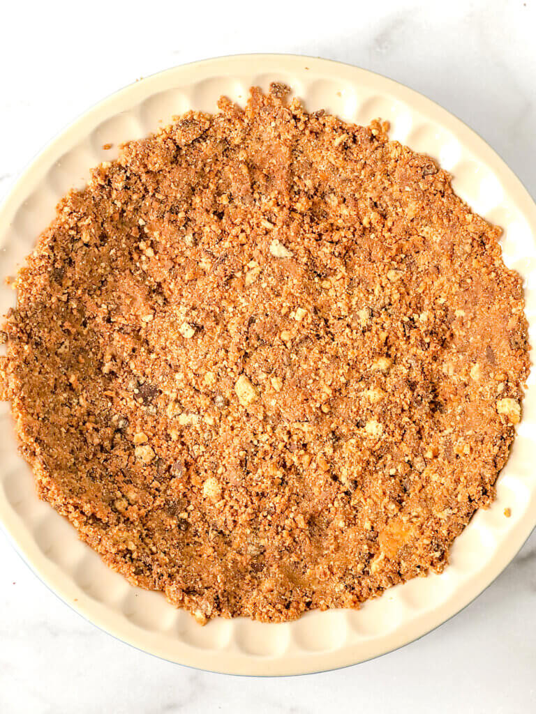 Press the crust mix into bottom and up sides of pie plate (or bottom of Springform pan)
