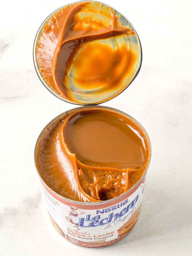 Can of Dulce de leche, opened to illustrate how thick it is.