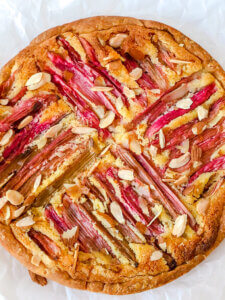Baked Frangipane tart is golden brown on top. Add almonds as desired