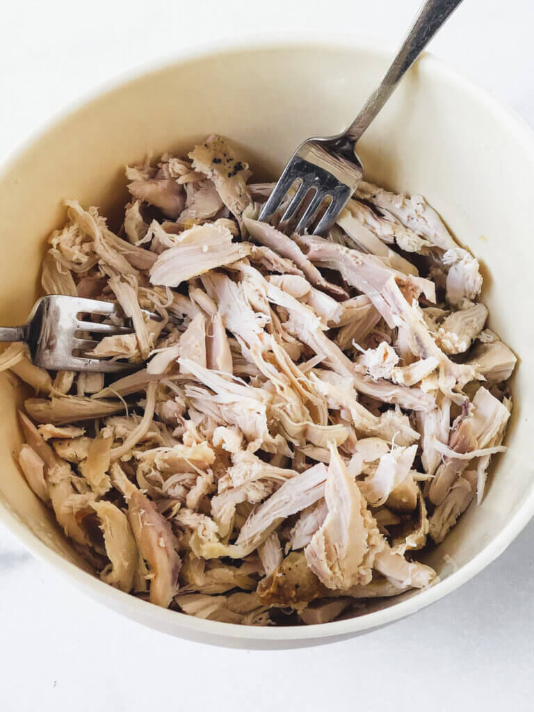 Bowl of shredded chicken from 1 rotisserie chicken, about 4 cups