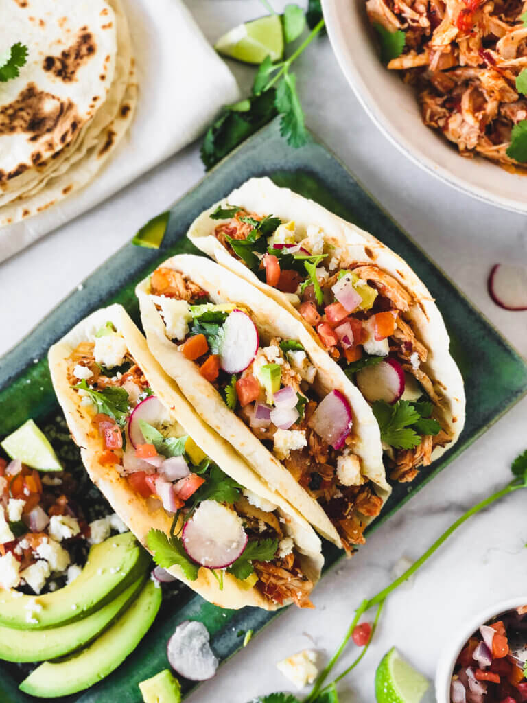 Chicken Tinga Taco Recipe - easy, just a few ingredients, a rotisserie chicken,  and a few minutes to make a classic Mexican taco filling!