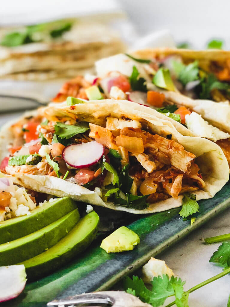 Chicken Tinga Taco Recipe - easy, just a few ingredients and a few minutes to make a classic Mexican taco filling!