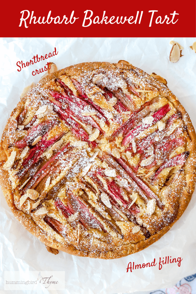 Rhubarb Frangipane Tart - a  beautiful Bakewell tart with orange accented almond filling, strips of rhubarb and roasted almonds. Indescribably delicious!