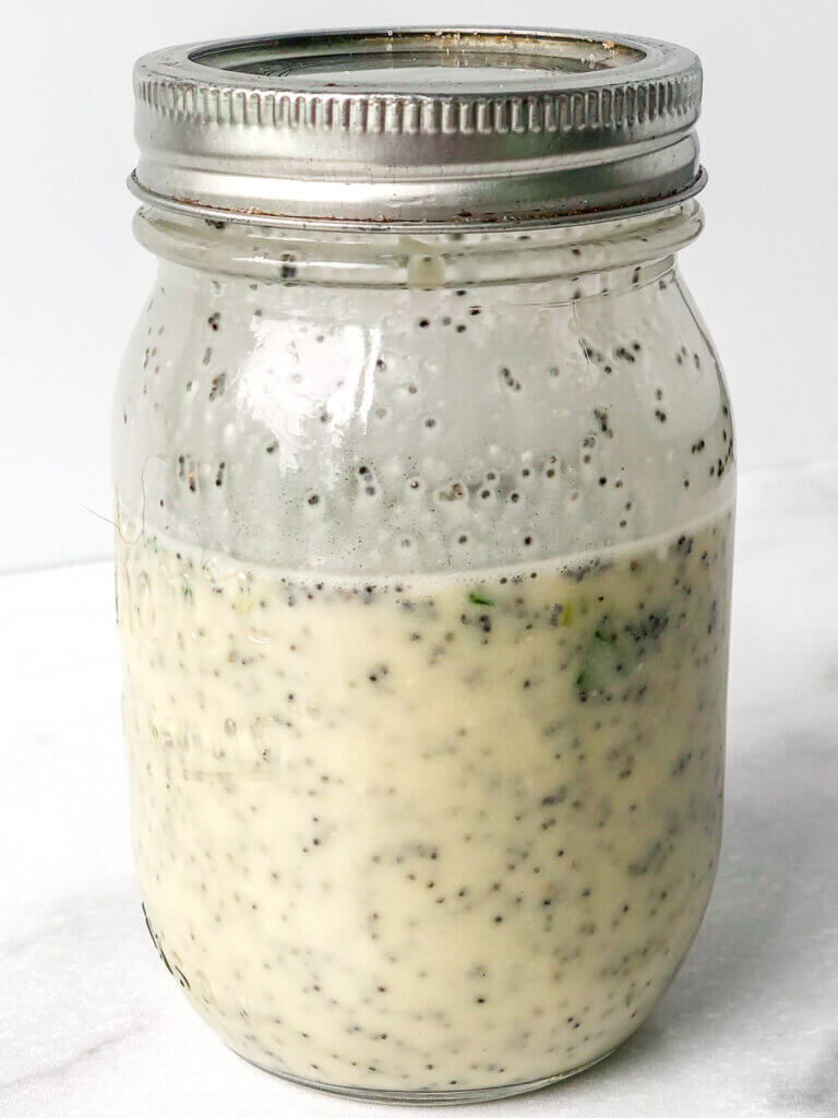 Finished Lime Poppyseed dressing looks creamy and is flecked with poppyseeds