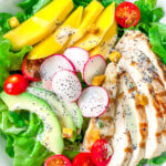 Lime Poppy Seed Dressing is tangy, sweet, creamy, the perfect compliment to salad of grilled chicken, avocado, mangoes and greens