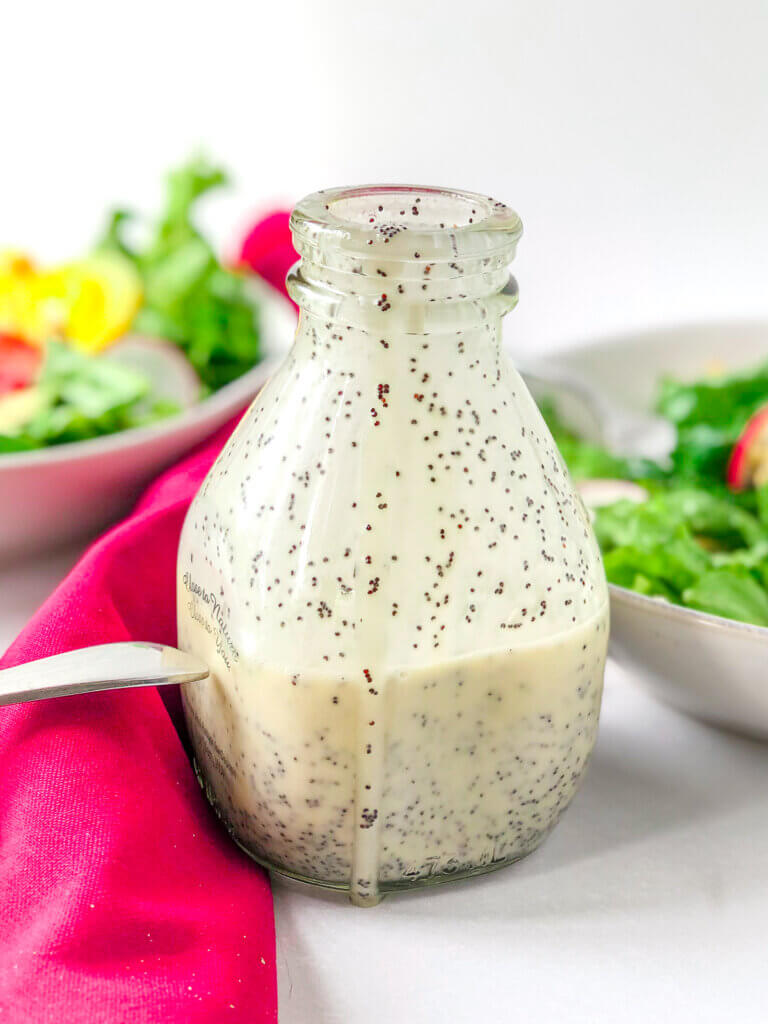 Lime Poppy Seed Dressing is tangy, sweet, creamy, the perfect compliment to salad of grilled chicken, avocado, mangoes and greens